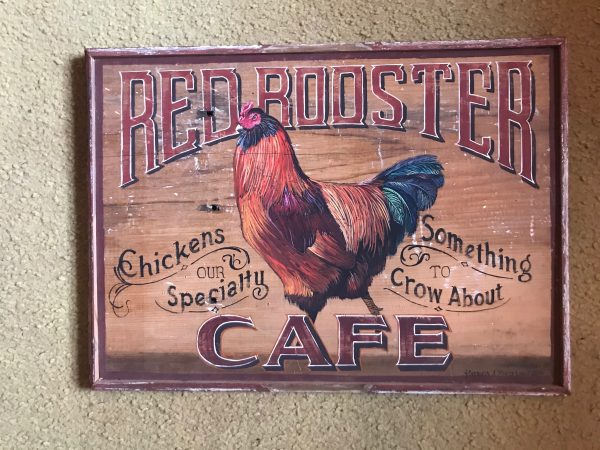 red rooster sign